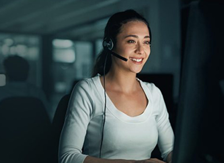 Businesswoman reading about CTM's emergency travel support case studies