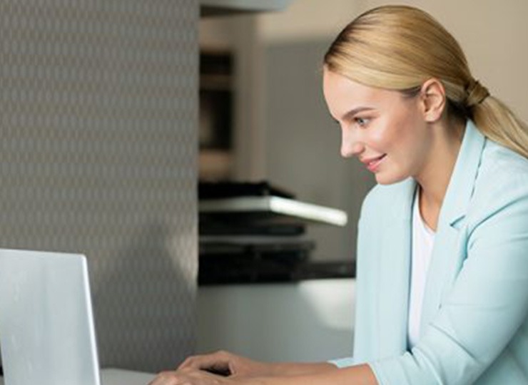 Businesswoman reading CTM's online adoption case study